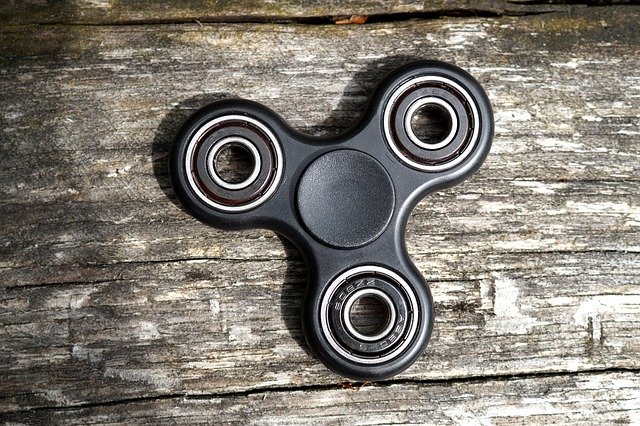 černý spinner